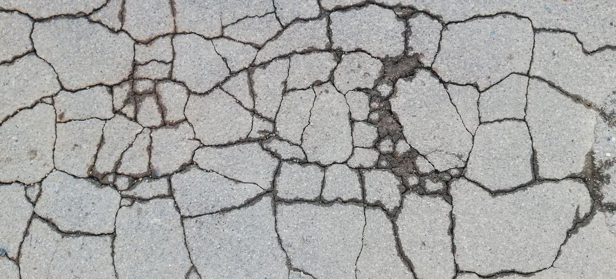 broken-concrete-sidewalk