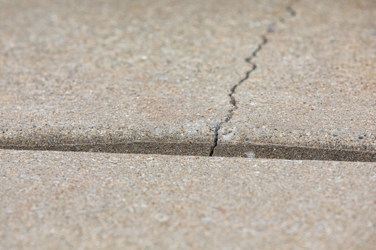 What Is Street Creep? (How It Damages Your Driveway and Foundation)